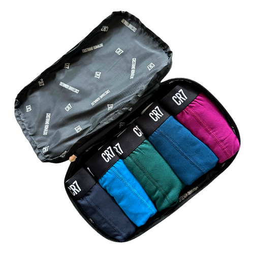 Cristiano Ronaldo's CR7 Underwear collections are designed and manufactured with an attention to detail seldom found in men’s underwear. Our CR7's 5-pack travel bags are an excellent value and fantastic gift option. Each travel bag includes 5 comfortable, breathable cotton blend trunks (95% cotton, 5% elastane). 5 cotton-blend trunks Color: Multicolor, blues, black, maroon, and green CR7 Underwear is machine washable.
